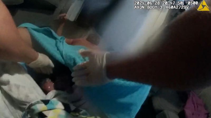 Bodycam footage shows officer helping deliver babyBodycam footage shows officer helping deliver baby 