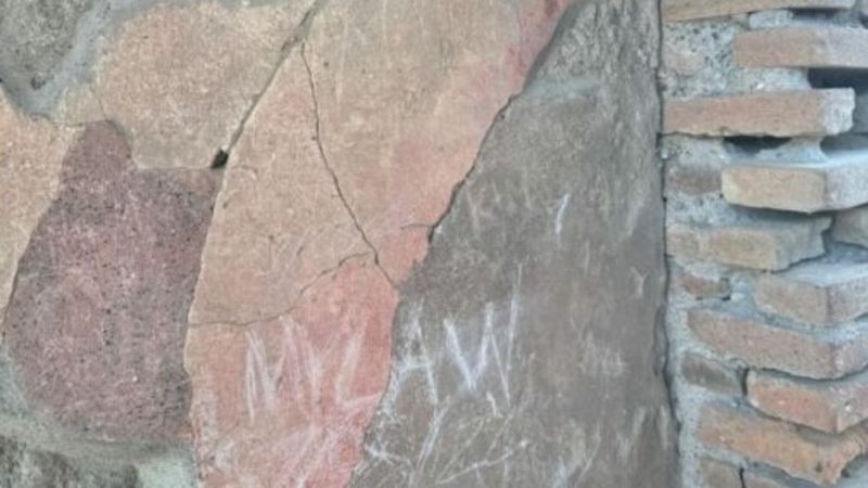 Tourist is caught carving initials into 2,000-year-old home at PompeiiTourist is caught carving initials into 2,000-year-old home at Pompeii 