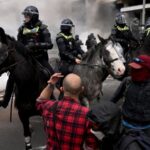 Protesters clash with police at Australia defense showProtesters clash with police at Australia defense show 